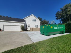 House with dumpster